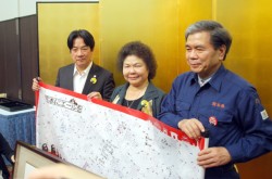 �����m���ɑ�p����̋`�����Ɖ������b�Z�[�W�������ꂽ�񂹏����𑡂鍂�Y�s�̒e�s���i�����j�Ƒ��s���������s���i���j